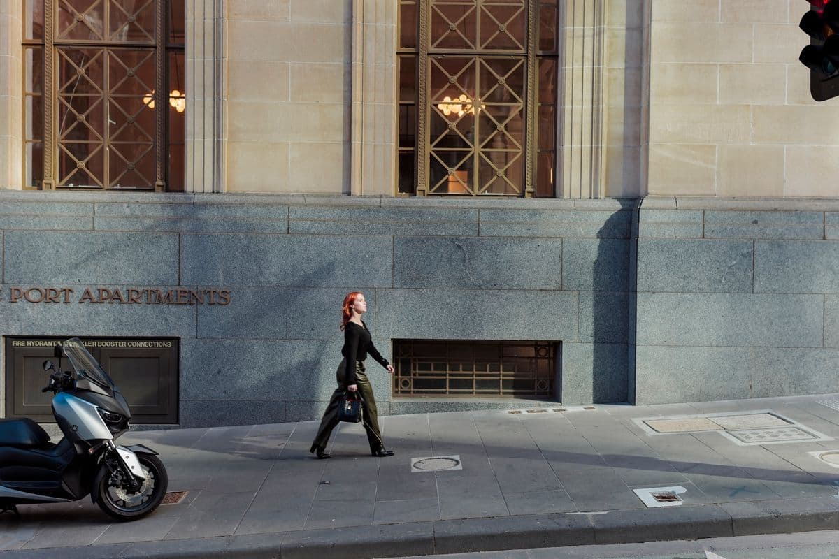 Lauren walking along a street in Victoria, Australia