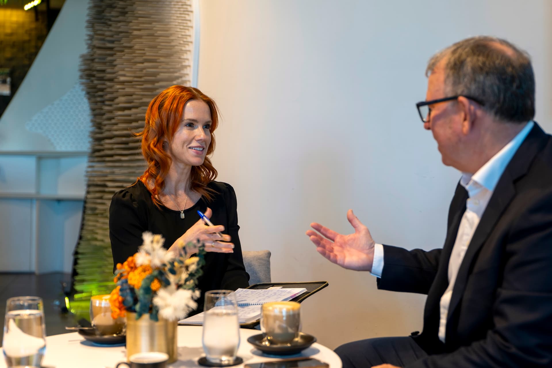 Lauren Nowak in conversation with a client
